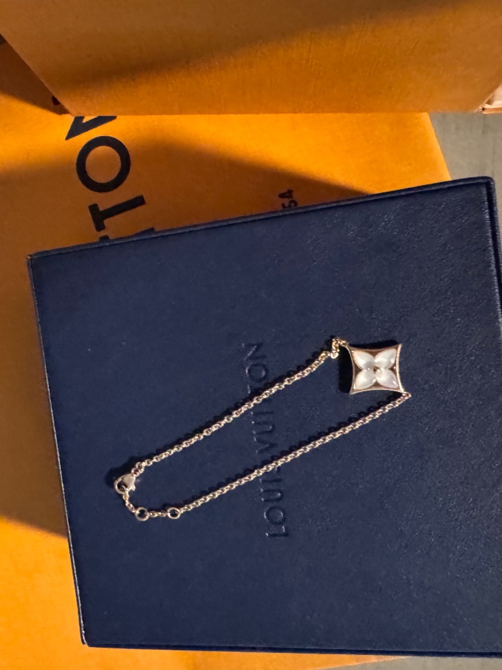 Louie Vuitton white mother of pearl bracelet